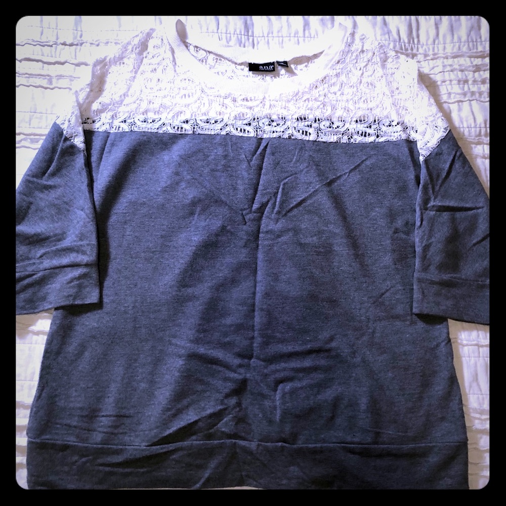Grey sweatshirt style top with lace neckline.